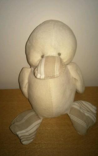 doudou peluche oiseau canard blanc beige jardin