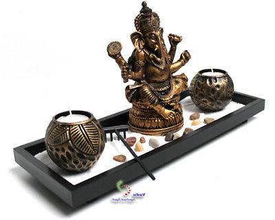 zen jardin avec ganesha figurine bougie sable